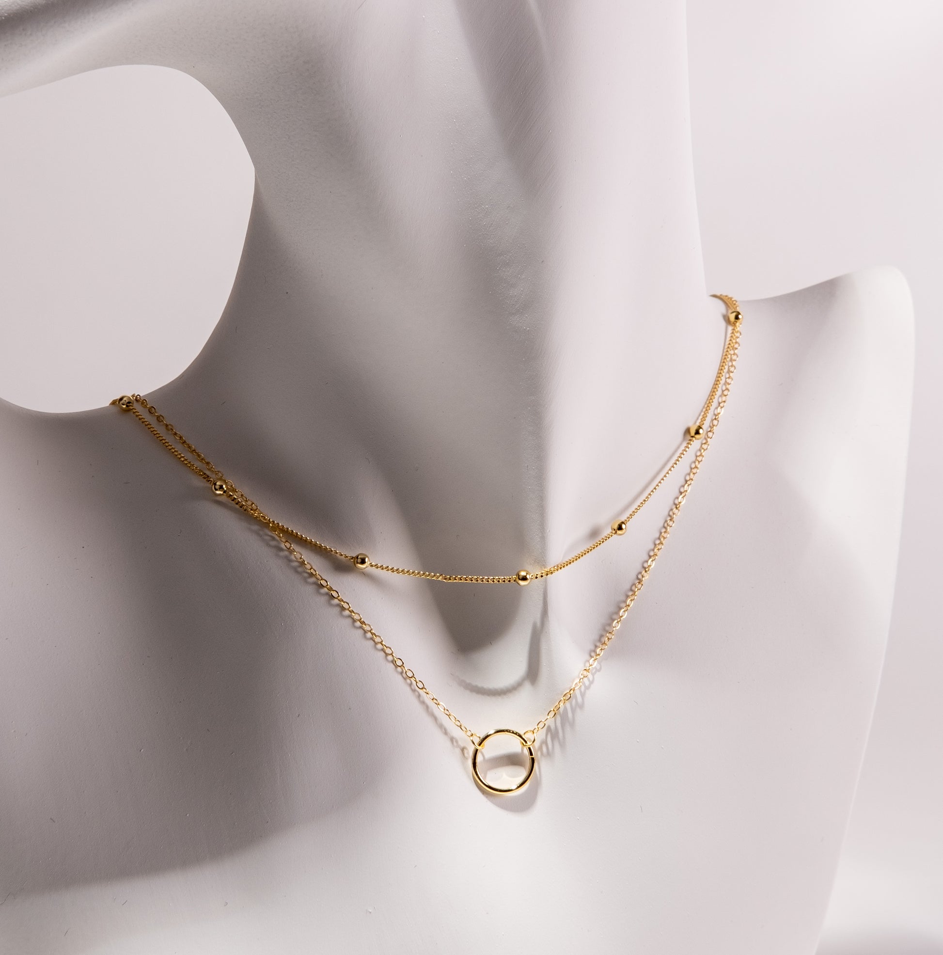 Sterling silver layered choker necklace from Fabufabu Design Store, featuring multiple delicate chains and a sleek modern design.